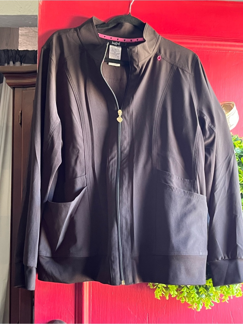 Women’s black scrub tops and scrub jacket